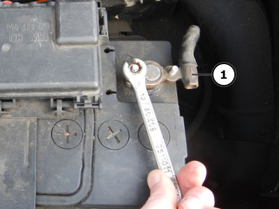 Disconnecting cable connector from battery's negative terminal